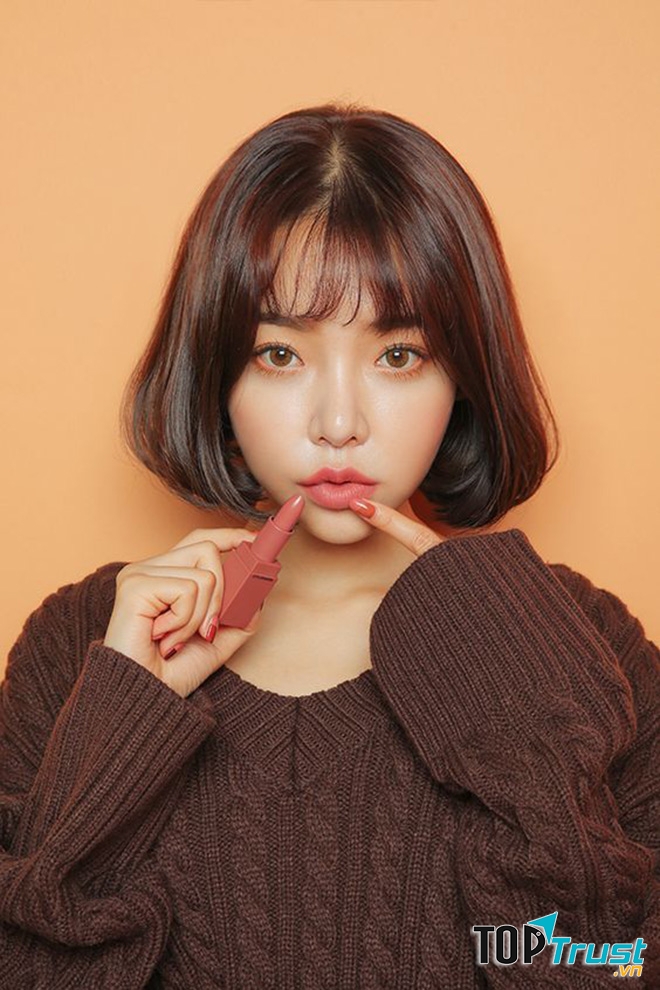 Tóc ngắn uốn phồng cụp