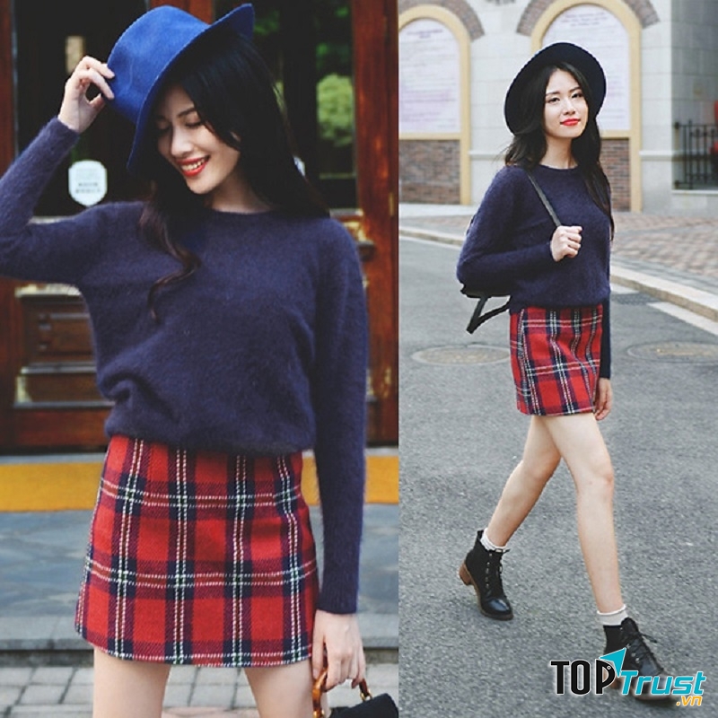 Set áo tay dài xanh đen phối với chân váy ca rô sọc đỏ khiến cho set đồ trở nên bắt mắt và thu hút. bạn đừng quên kết hợp phụ kiện đi kèm như mũ tông màu lạnh như màu áo, balô đen hay bốt đen cho set đồ này
