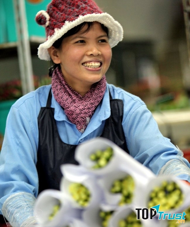 Chị bán hoa (ảnh minh họa)