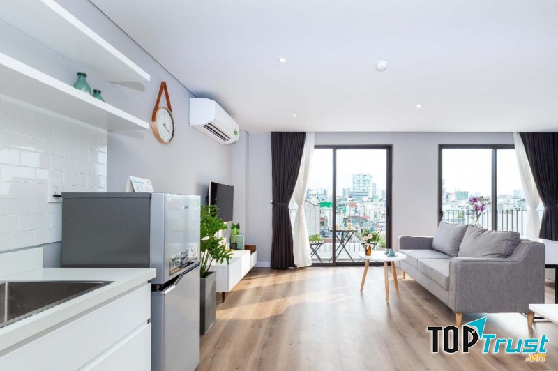 Phòng nghỉ được trang bị đầy đủ tiện nghi tại Cozrum Homes - Premier Residence.