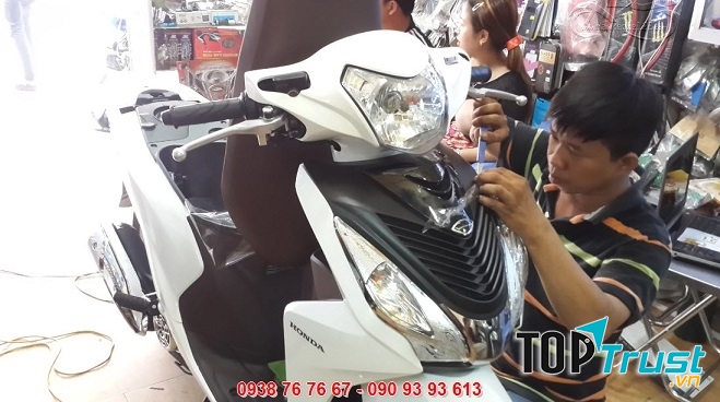 Cửa hàng dán keo xe 123