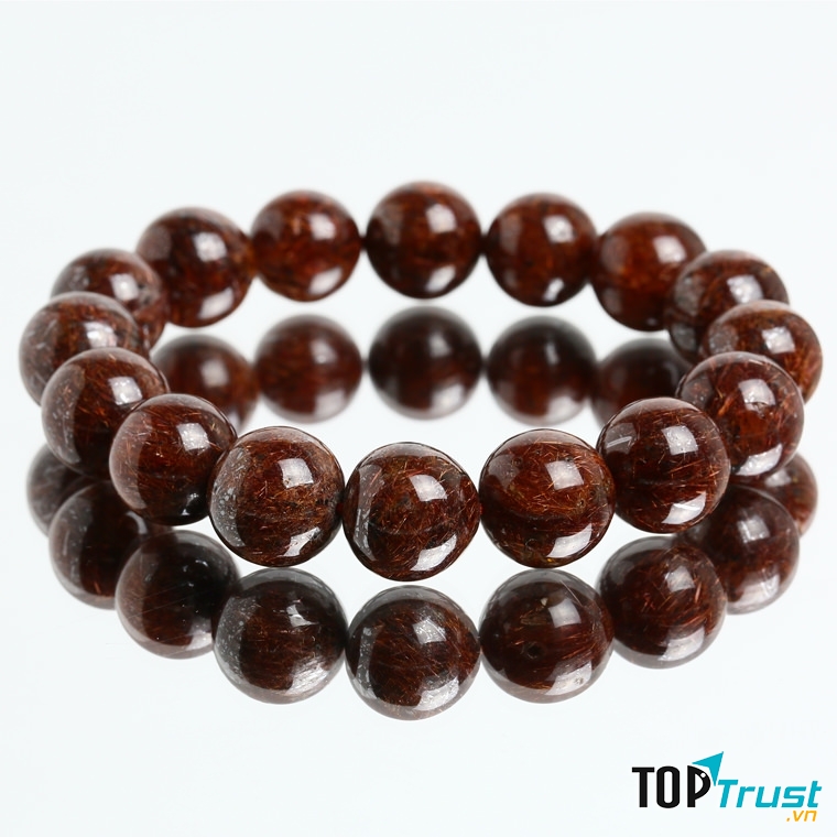 Trang sức được làm từ thạch anh nâu tóc đỏ.