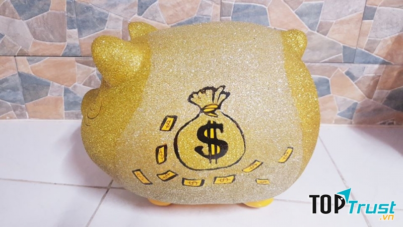 Bỏ vào ống tiết kiệm số tiền dư sau khi mua sắm