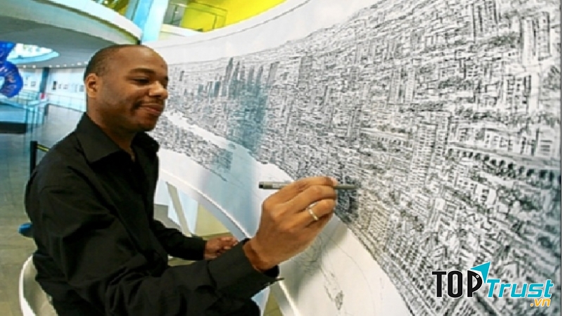 Hình ảnh họa sĩ Stephen Wiltshire đang vẽ lại toàn cảnh thành phố
