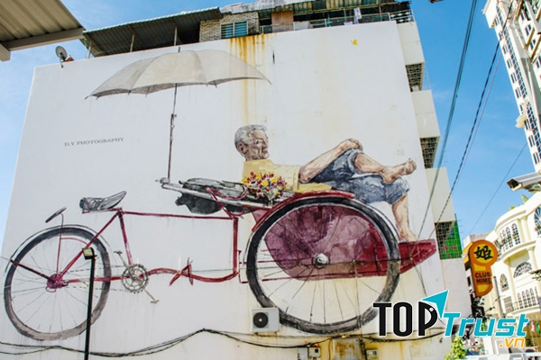Bức tranh người đạp xích lô đợi khách