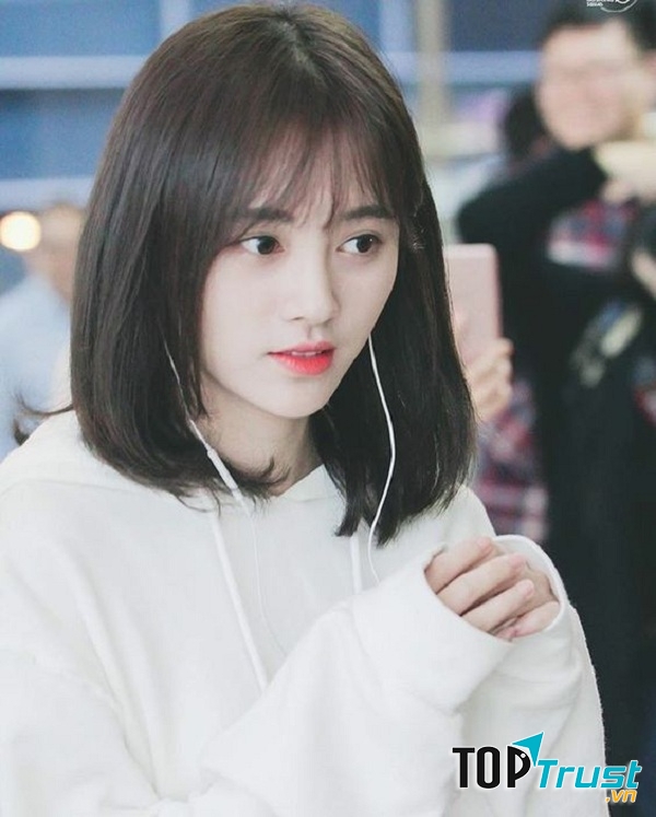 Tóc ngắn uốn cụp dập phồng