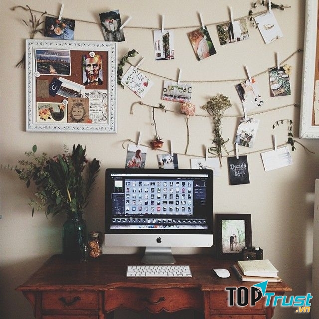 Những bức ảnh được trang trí khéo léo làm cho không gian trở nên ấm cúng hơn.