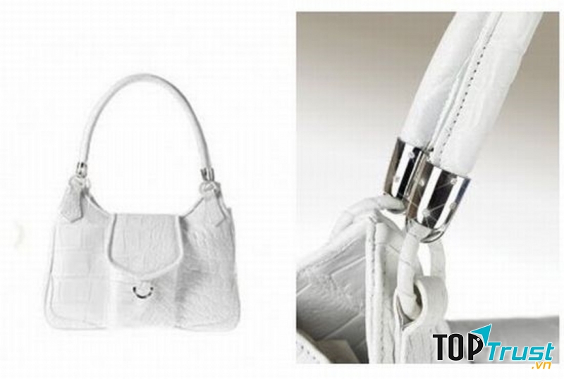 Sản phẩm tuyệt vời này được làm từ da cá sấu, ngoài ra còn có 39 viên kim cương và vàng trắng